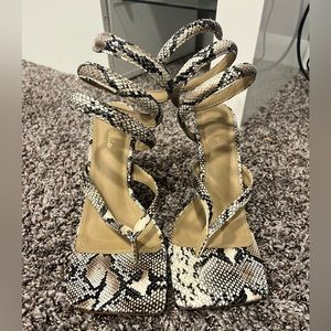 Snakeprint wrap around sandal heel!